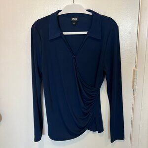 Long sleeved collared, wrap front blouse